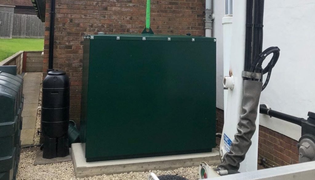 A fire rated tank being lifted in to position